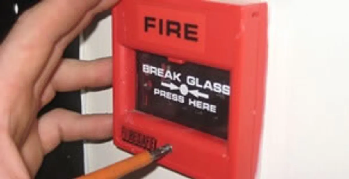 fire alarm installation service showing manual fire alarm pull station installed by licensed electricians in Tucson, AZ